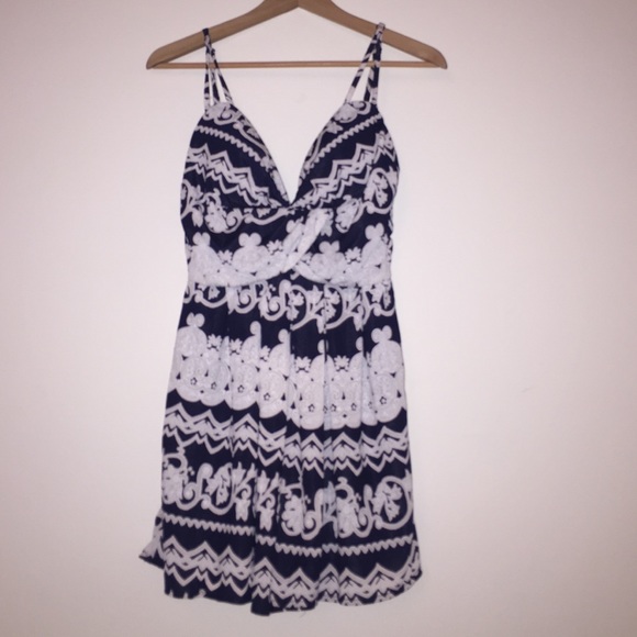 Navy blue and white patterned romper