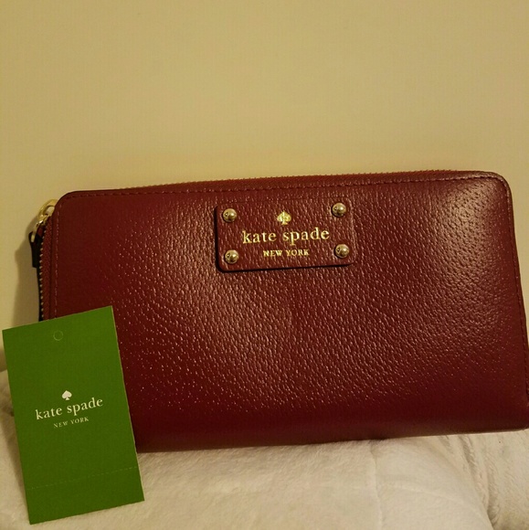 Brand New. Kate Spade Wallet. Plum Color.