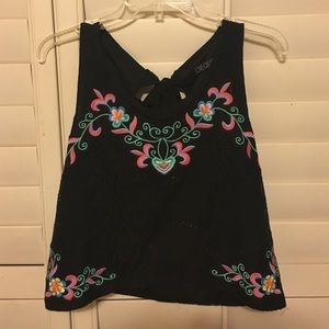 Black tank crop top with colorful floral design