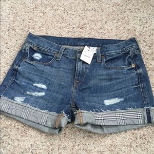 J Crew distressed denim shorts size 25