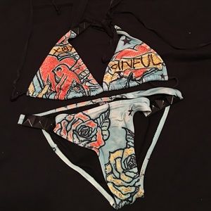 Sinful two piece bathing suit