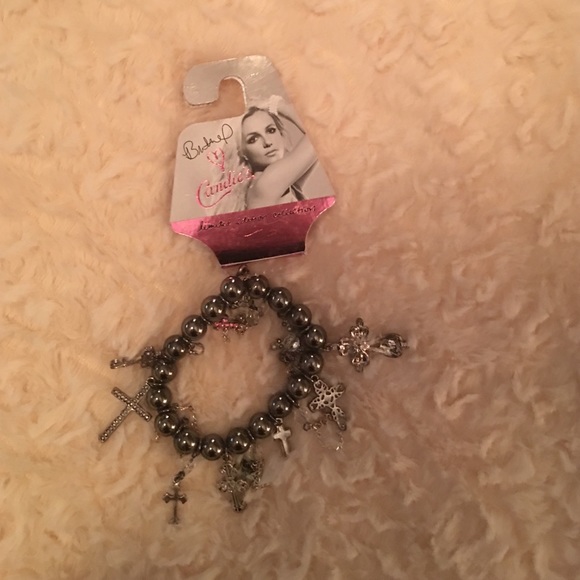 Britney Spears cross bracelet. Candies