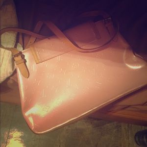 Louis Vuitton hand bag.