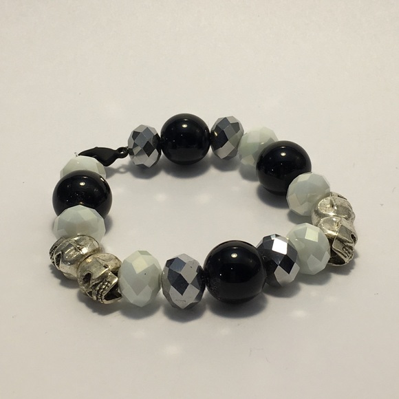Silver skulls, white and black beads!