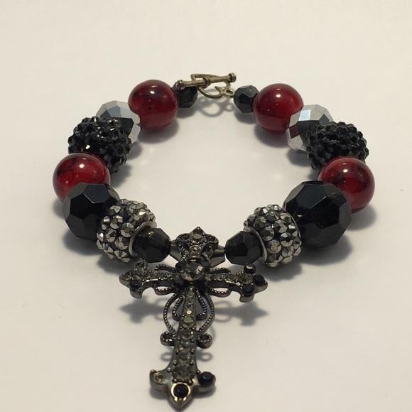 Sexy cross charm with blood-red beads!
