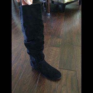 Tall black boots