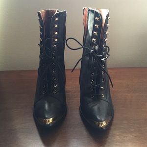 ✨ Jeffrey Campbell lace up booties.