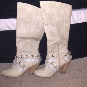 Calf high buckle heel boots