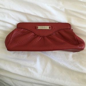 Red leather small cosmetic pouch clutch