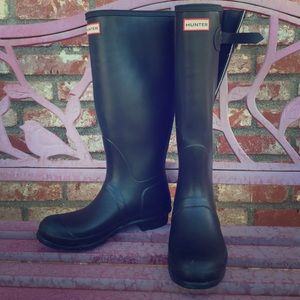 Hunter rain boots.