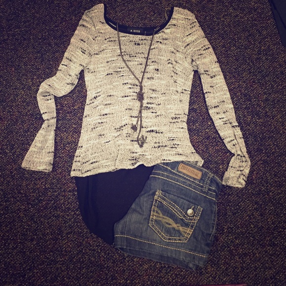 Cute shirt! With open back. Never worn