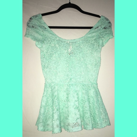 Juniors turquoise peplum top