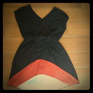Navy blue dress with orange and white accent