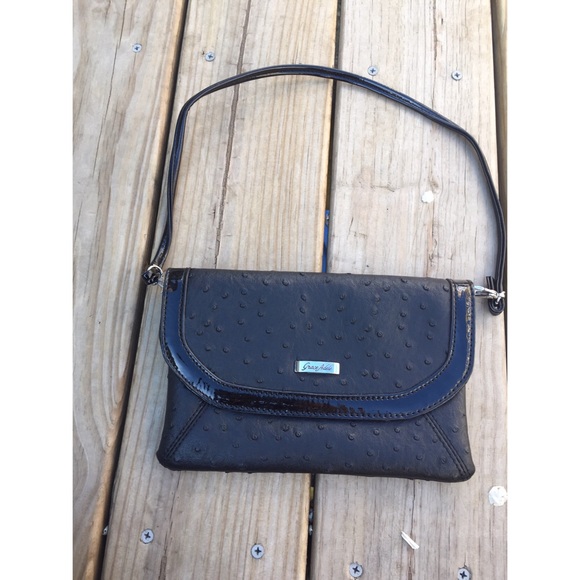 Grace Adele black clutch