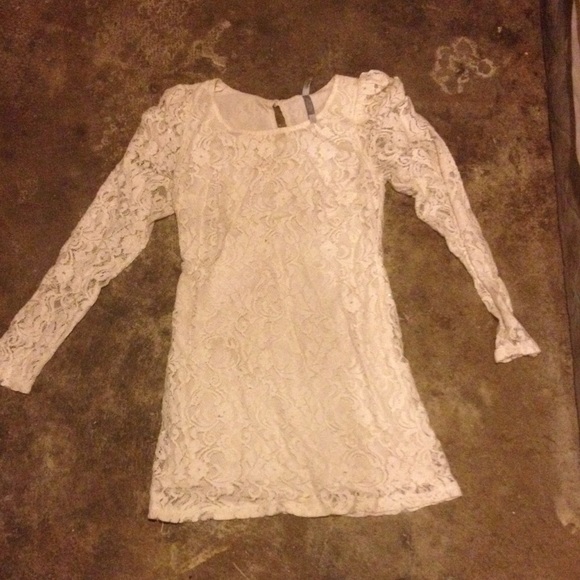 Cream colored lace dress.