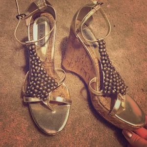 Gold and bronze Steve Madden wedges.