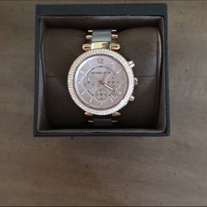 Rose Gold Micheal Kors watch.