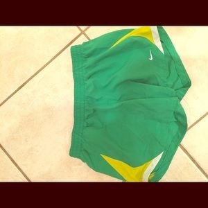 Nike Dri Fit green and yellow shorts