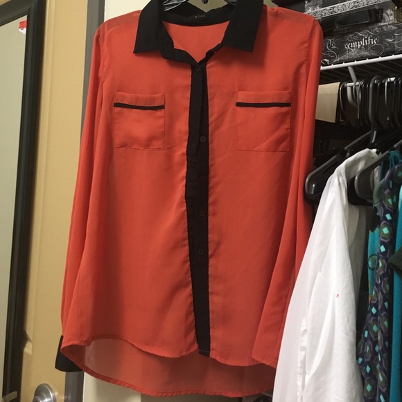 Sheer orange with black collar and wrist