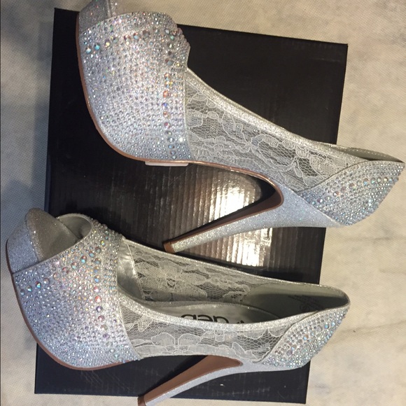 New silver sparkle peep toe pumps