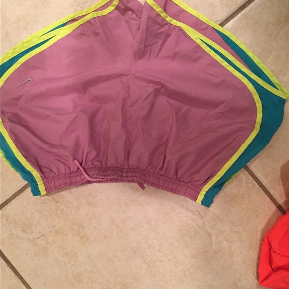 Nike Dri Fit shorts in purple and teal