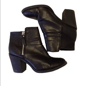 Black zip up heeled booties