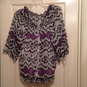 Waist gathered blouse over cami.