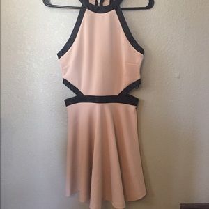 Tan dress with black faux leather trim