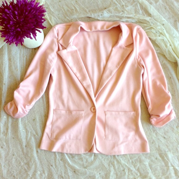 Light pink half sleeves blazer.