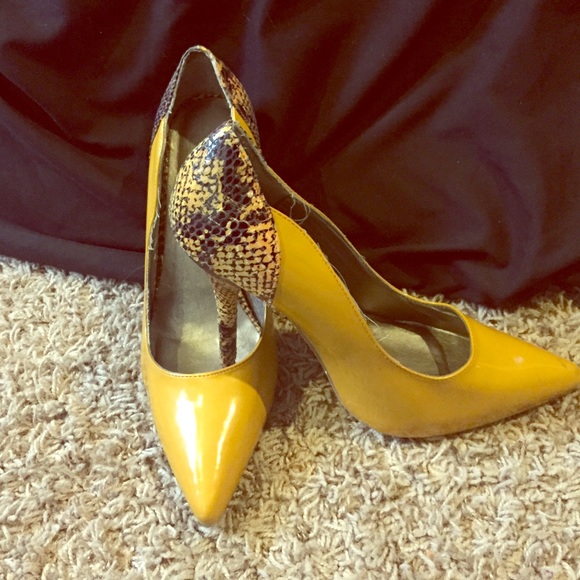 Yellow and snakeprint heels.