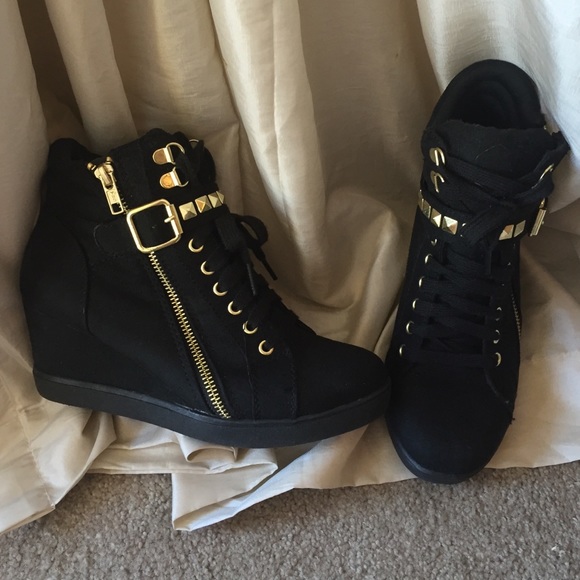 Black faux suede wedge sneakers with gold details