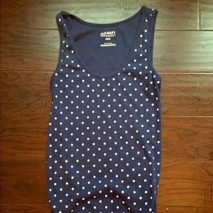 Navy and white polka dotted maternity top