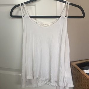 Flowy white tank