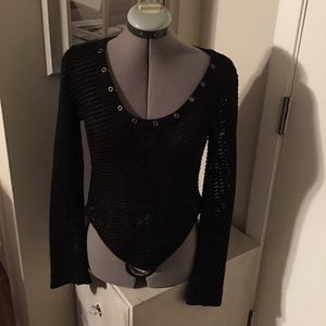 Black Vneck sweater w/uneven hem.