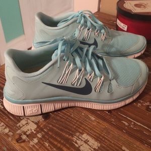 Teal Nike free shoes