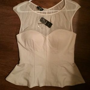 Bebe Sheer yoke peplum top