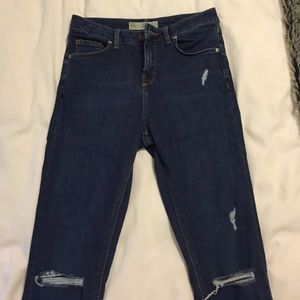 High waisted Top Shop Jeans with knee rips