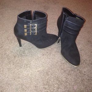 Heeled mixed material booties