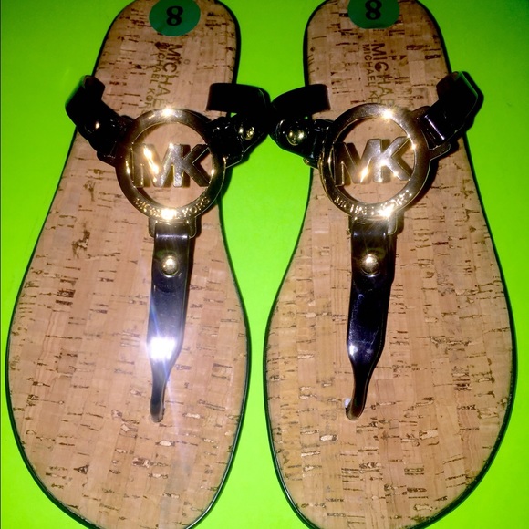Michael Kors Flip Flops Black Gold size 8 sandals