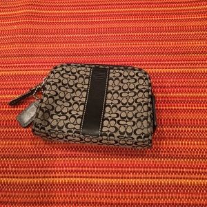 Coach Mini makeup bag.
