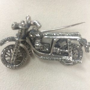 Sterling Silver mortar cycle brooch