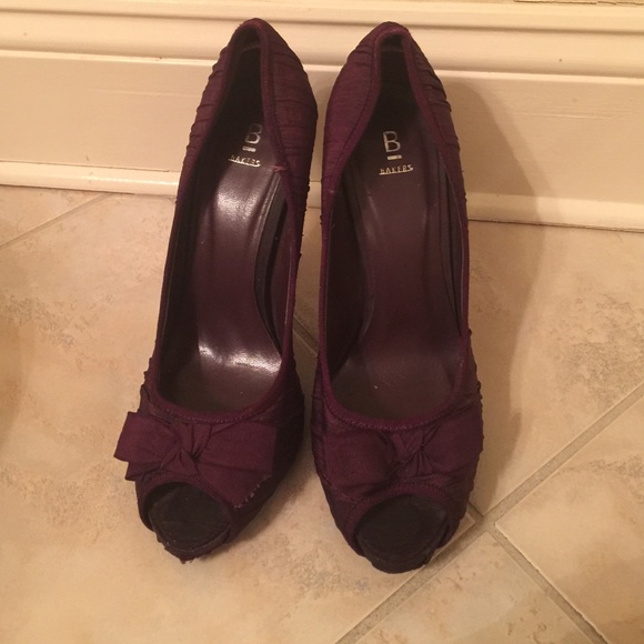 Baker's Purple Pumps ! With bows on toes .