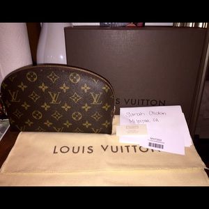 Authentic Louis Vuitton cosmetic bag in GM