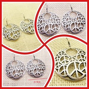 Ethnic style hollow carved peace sign earrings