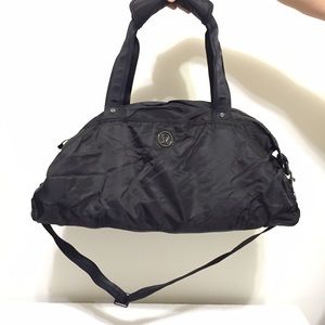 Lululemon duffle bag with pink interior
