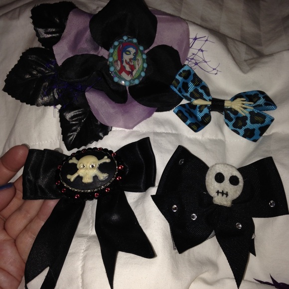 Set of four skull themed hair clips