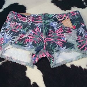 multi colored tropical print denim shorts