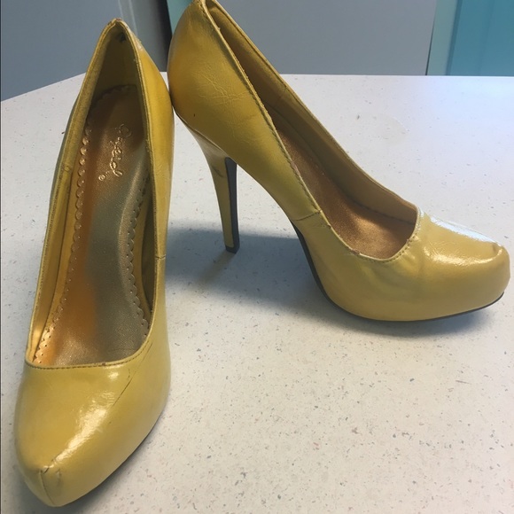 Yellow Pumps with small platform