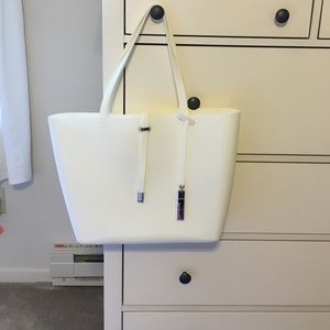 Vince Camuto white waterproof bag- never been used