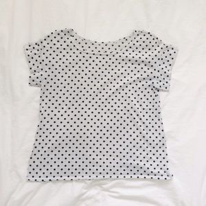 White square top with black polka dots